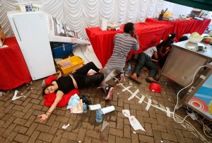 Injured people cry for help after gunmen went on a shooting spree in a shopping centre in Nairobi